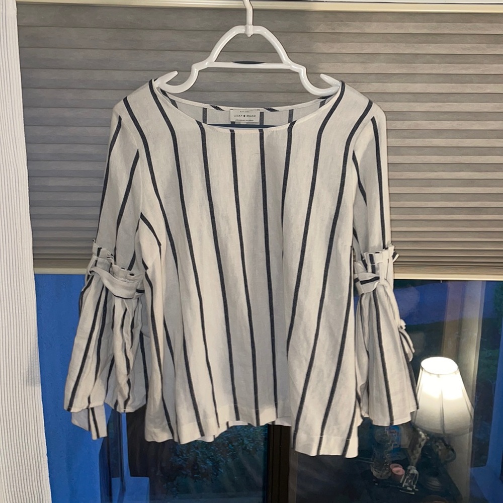 Striped shirt with bell sleeves